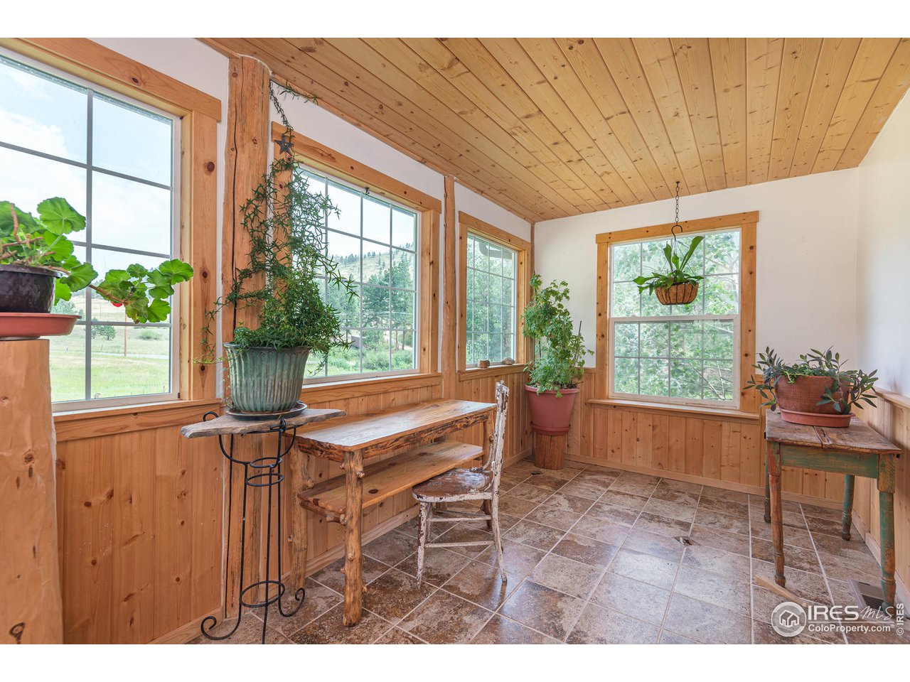 2725 Stove Prairie Road Bellvue, CO 80512 - Photo 25 of 40 Sunroom