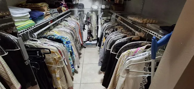a bathroom with a sink and mirror with toilet