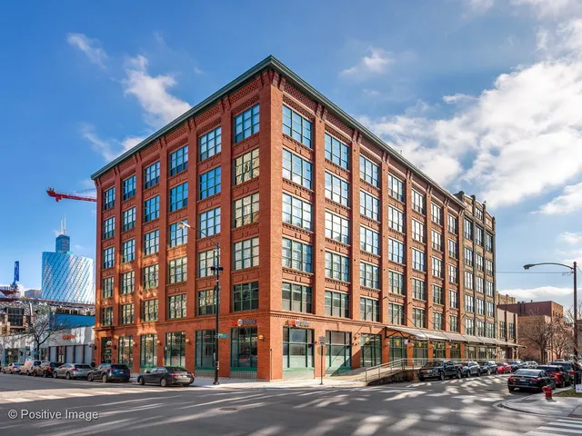 a view of a building with a street