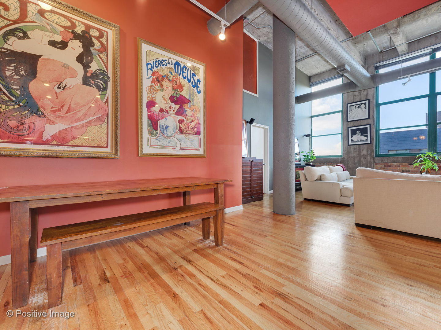1017 West Washington Boulevard, Unit 6F Chicago, IL 60607 - Photo 7 of 20 a living room with furniture and a wooden floor