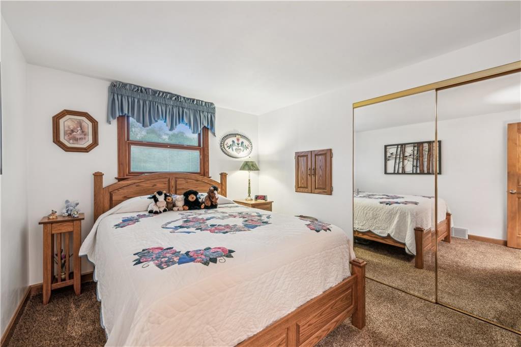 250 Victory Road Saxonburg, PA 16056 - Photo 15 of 33 a bed room with a bed and a chair
