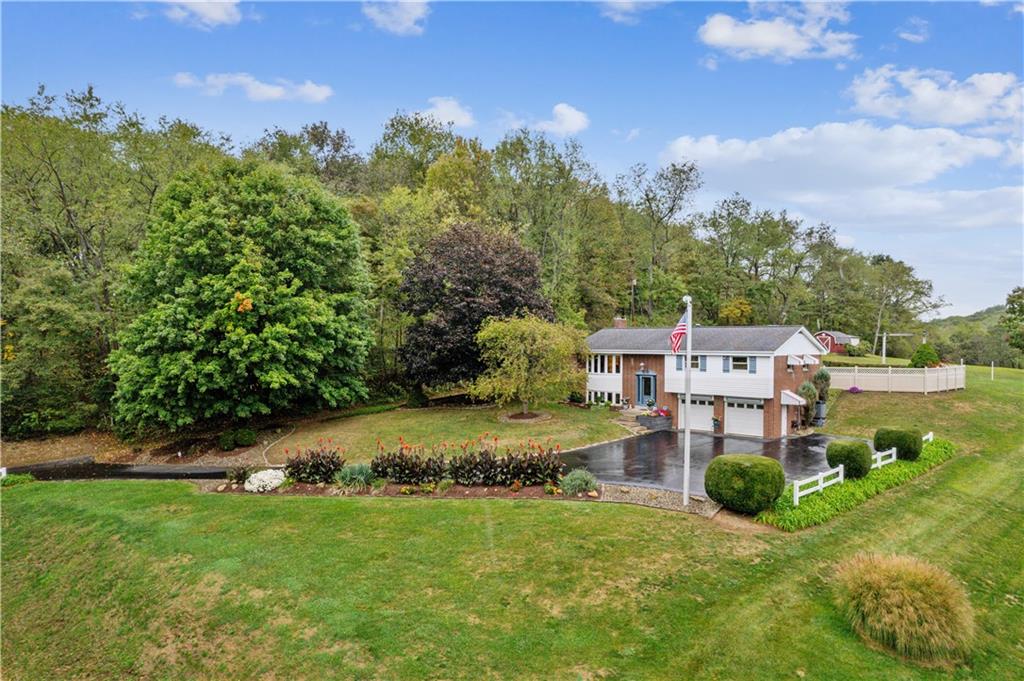 250 Victory Road Saxonburg, PA 16056 - Photo 24 of 33 an aerial view of a house with a yard