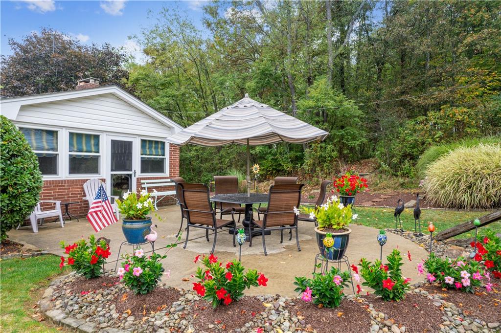 250 Victory Road Saxonburg, PA 16056 - Photo 26 of 33 a view of a chair and table in the garden view