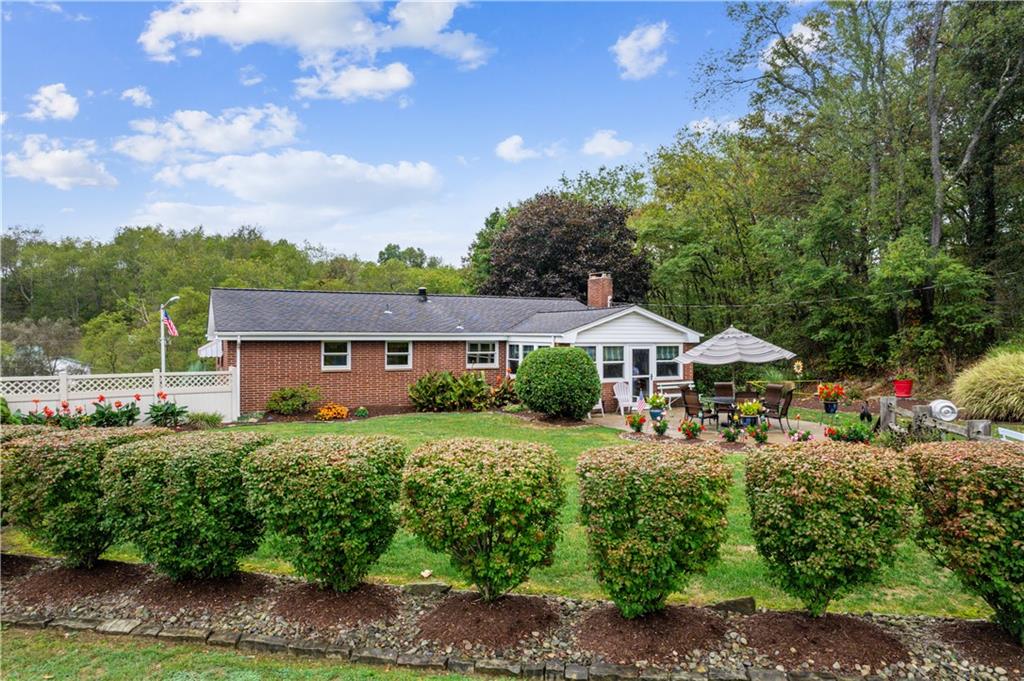 250 Victory Road Saxonburg, PA 16056 - Photo 28 of 33 a front view of a house with a yard