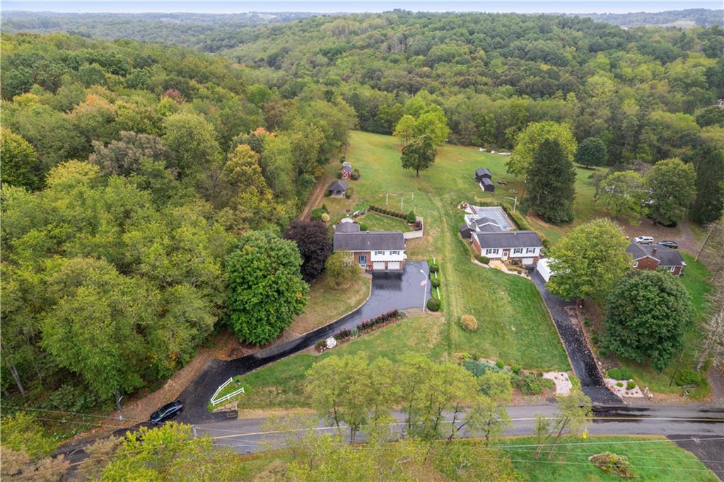 250 Victory Road Saxonburg, PA 16056 - Photo 33 of 33 an aerial view of residential houses with outdoor space and trees