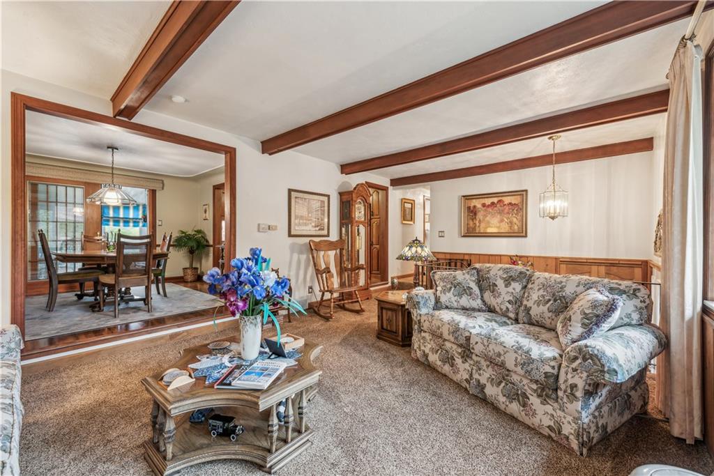 250 Victory Road Saxonburg, PA 16056 - Photo 6 of 33 a living room with furniture and flowers