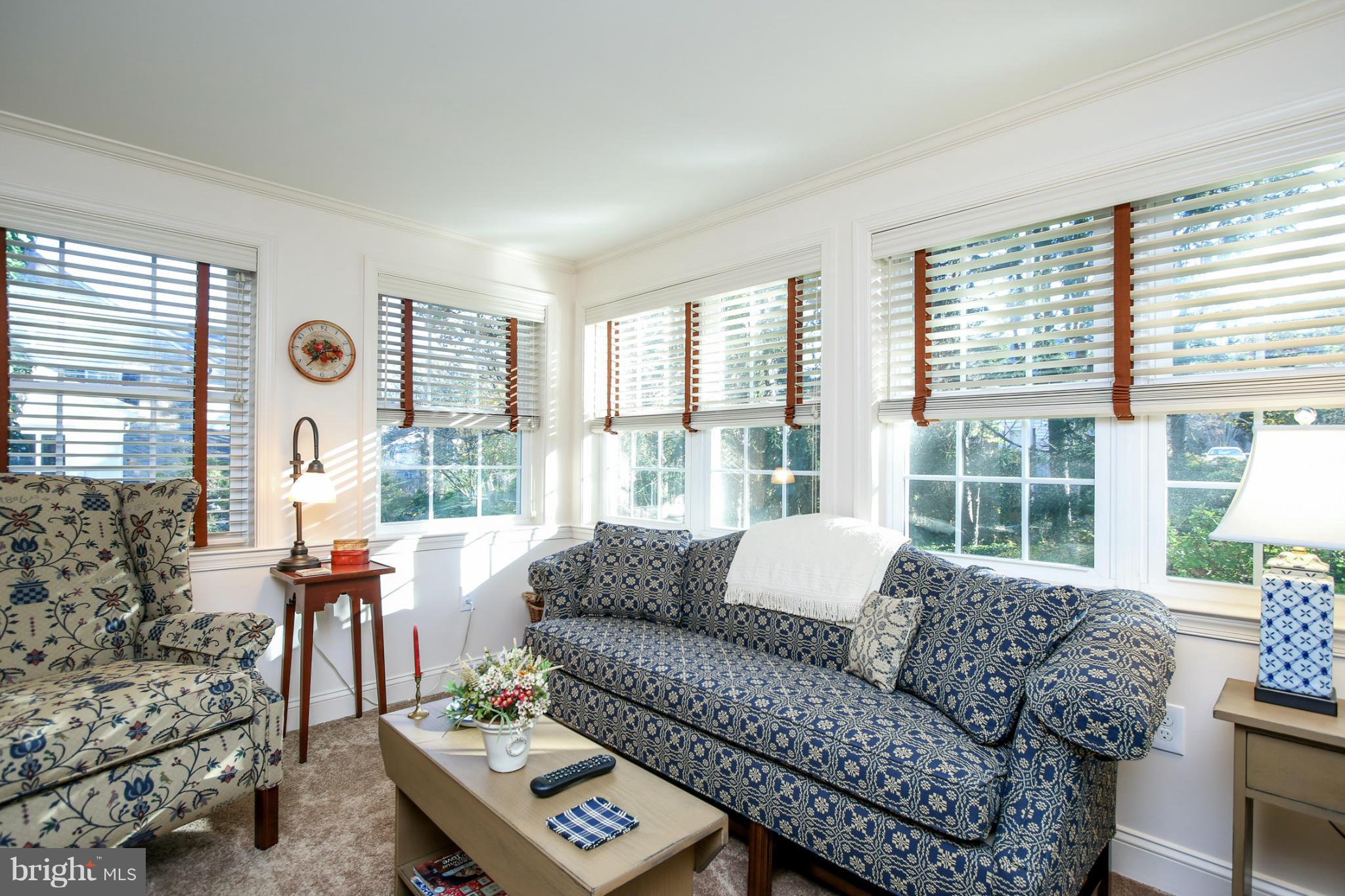 503 Worcester Road Towson, MD 21286 - Photo 4 of 18 a living room with furniture and a large window