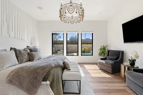 a living room with furniture fireplace and flat screen tv