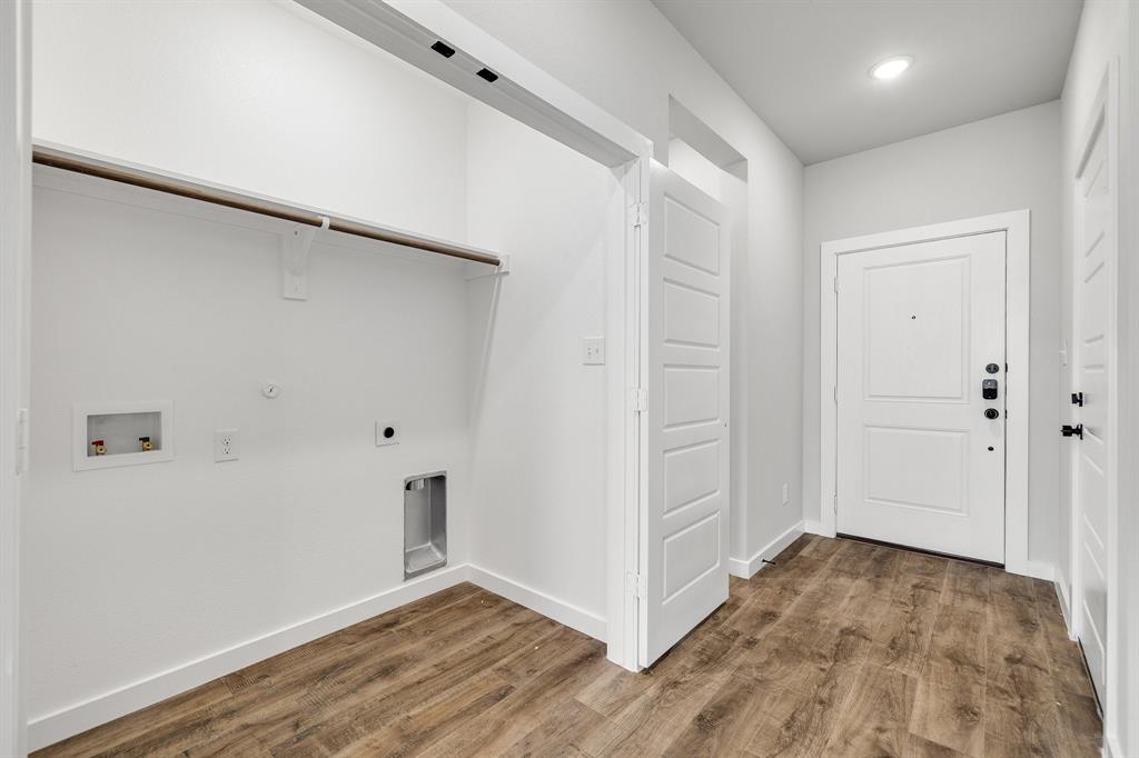 4423 Clovis Street Midlothian, TX 76065 - Photo 5 of 27 an empty room with wooden floor