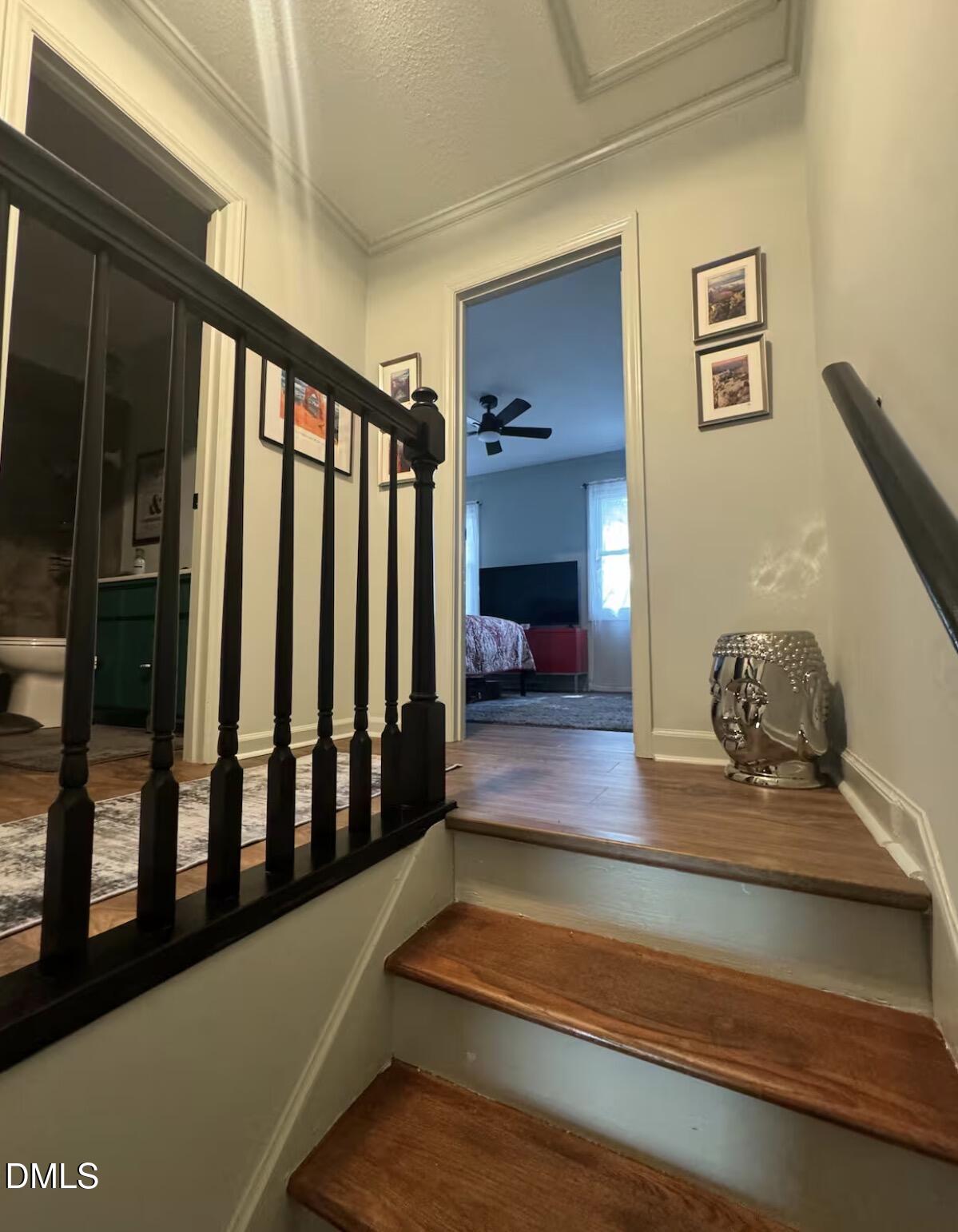 6369 New Market Way Raleigh, NC 27615 - Photo 6 of 14 a view of entryway and hall with wooden floor
