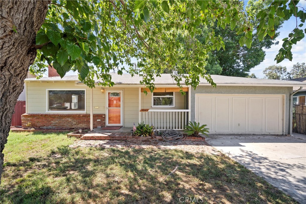 5943 Birch Street Riverside, CA 92506 - Photo 1 of 1 a front view of a house with a yard