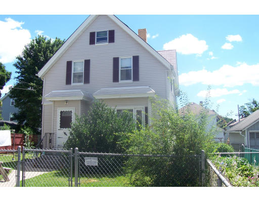46 Richmond Street Fall River, MA 02721 - Photo 1 of 1 a view of a yard in front of a house with a large tree