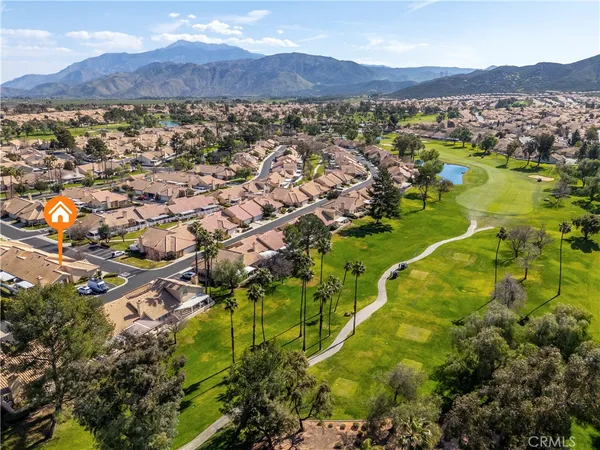 a view of a city with mountains in the background