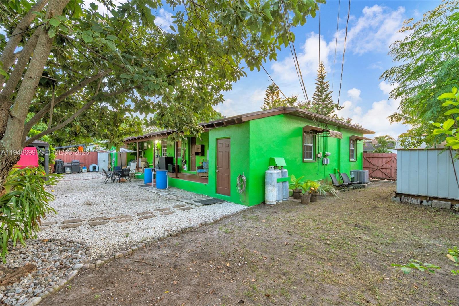 2671 Southwest 30th Avenue Miami, FL 33133 - Photo 13 of 43 a front view of a house with garden