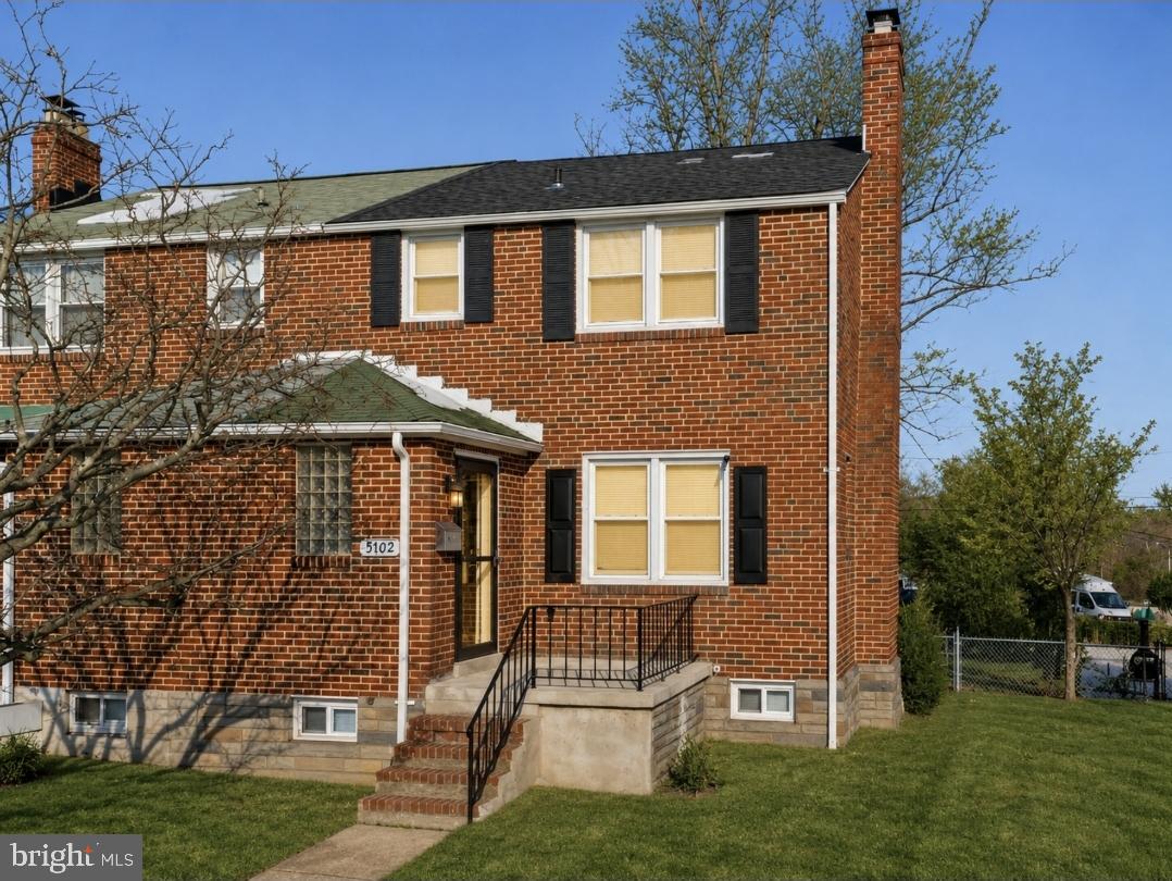 5102 Plymouth Road Baltimore, MD 21214 - Photo 28 of 32 front view of house with a yard
