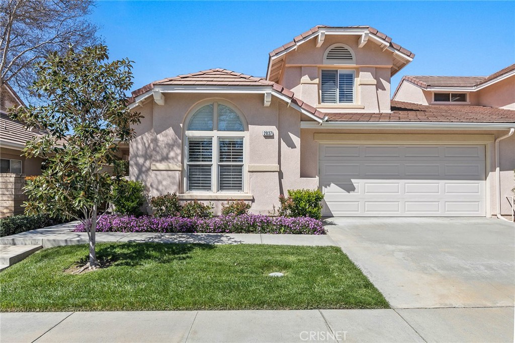 2037 Freesia Avenue Simi Valley, CA 93063 - Photo 1 of 1 a front view of a house with a yard
