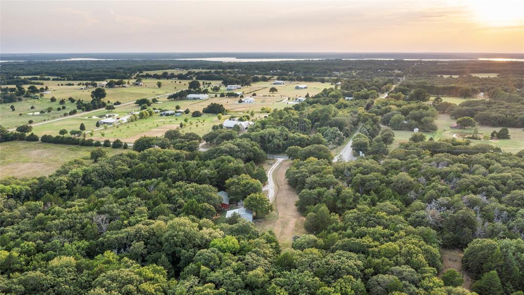 1050 Cooks Corner Road Pottsboro, TX 75076 - Photo 1 of 1 Aerial view at dusk of a rural view