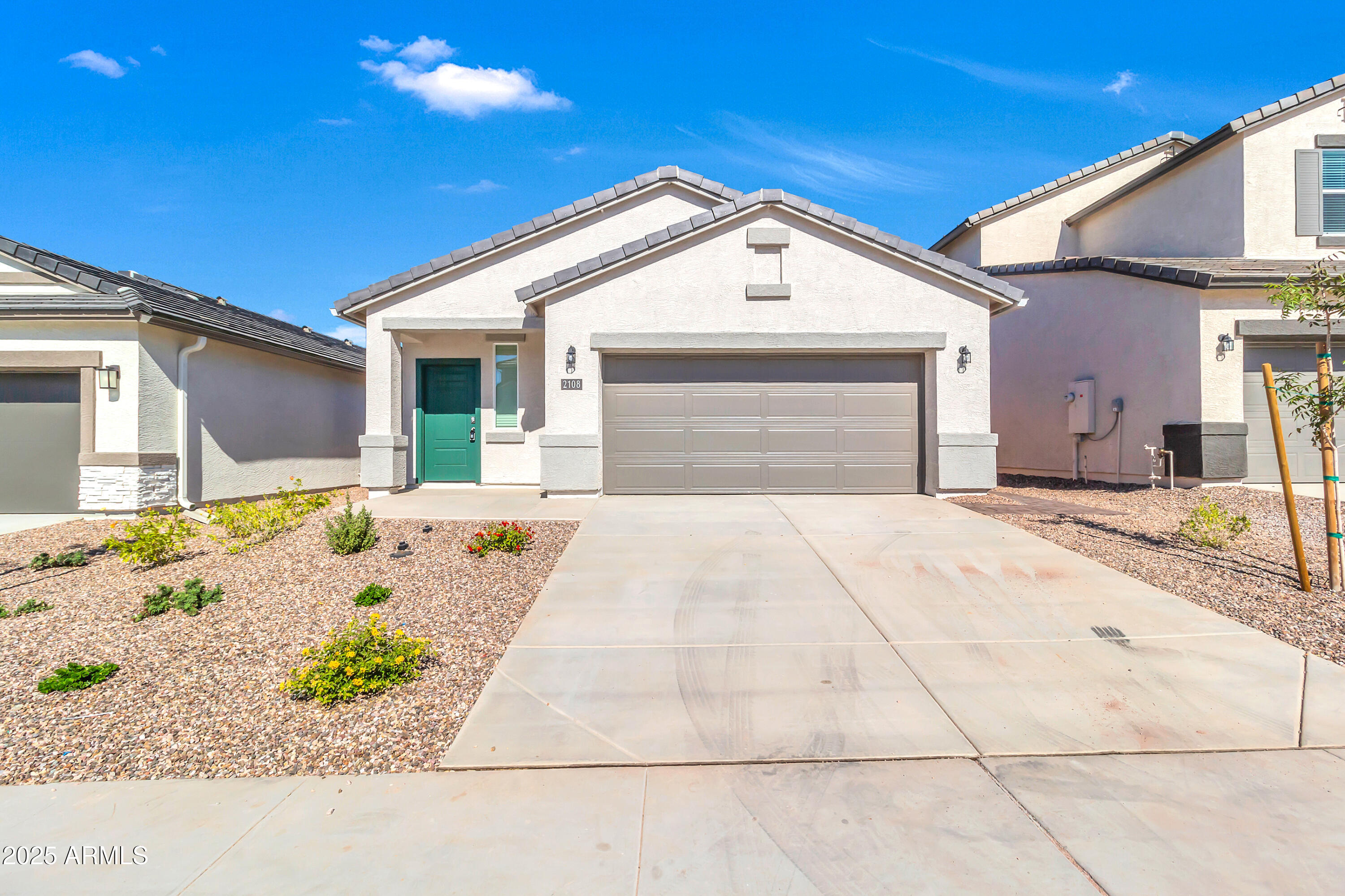 2108 West Sheridan Avenue Apache Junction, AZ 85120 - Photo 1 of 49 a front view of a house with a yard