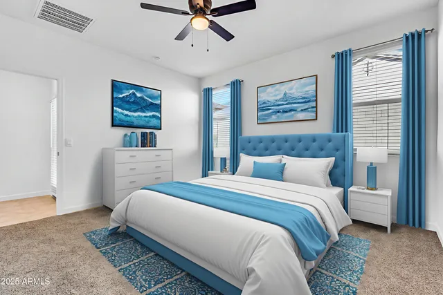 a bedroom with bed and window