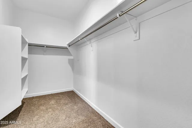 a view of a room with racks on the wall