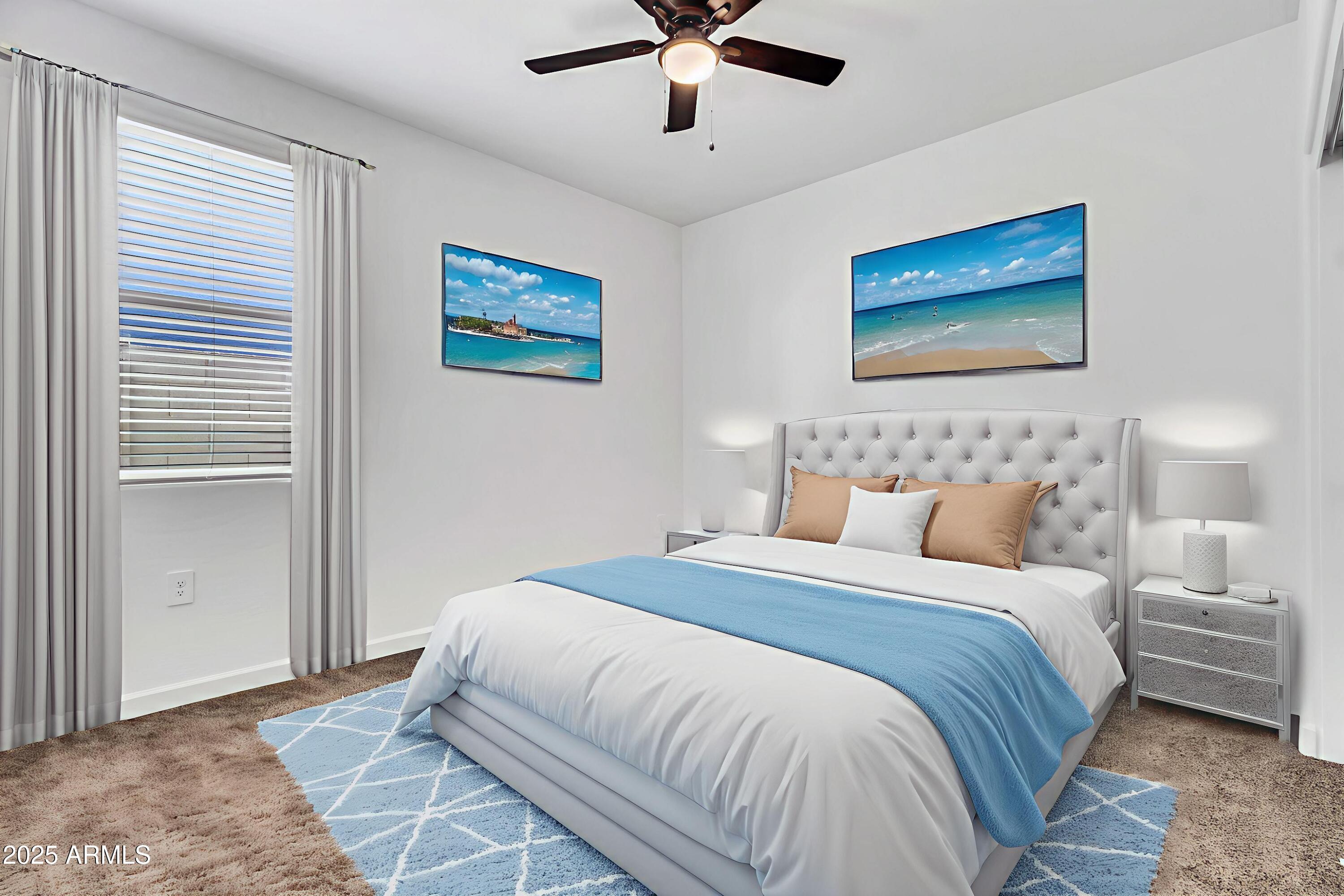 2108 West Sheridan Avenue Apache Junction, AZ 85120 - Photo 30 of 49 a bedroom with bed and ceiling fan