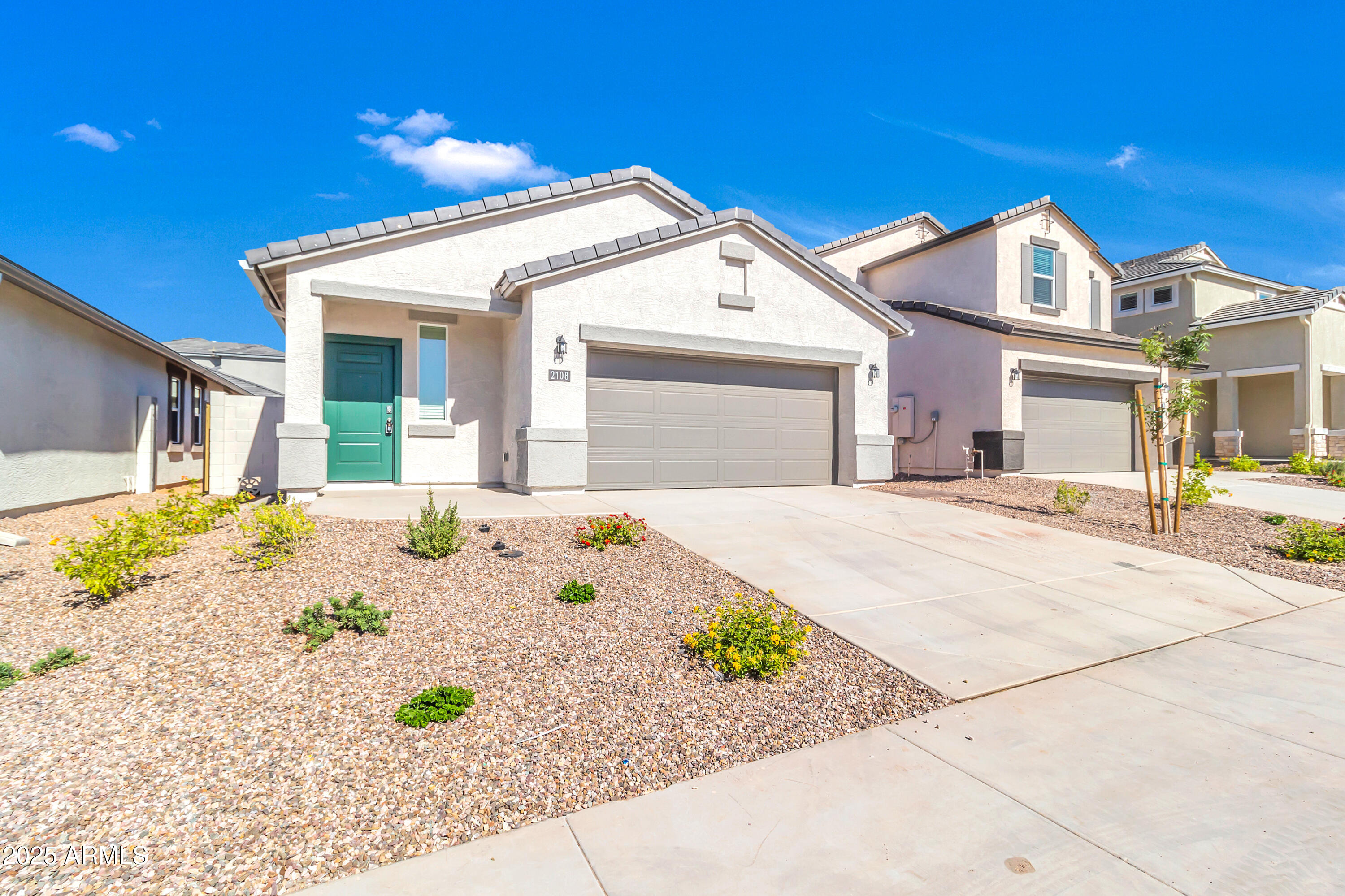2108 West Sheridan Avenue Apache Junction, AZ 85120 - Photo 3 of 49 a front view of a house with a outdoor space