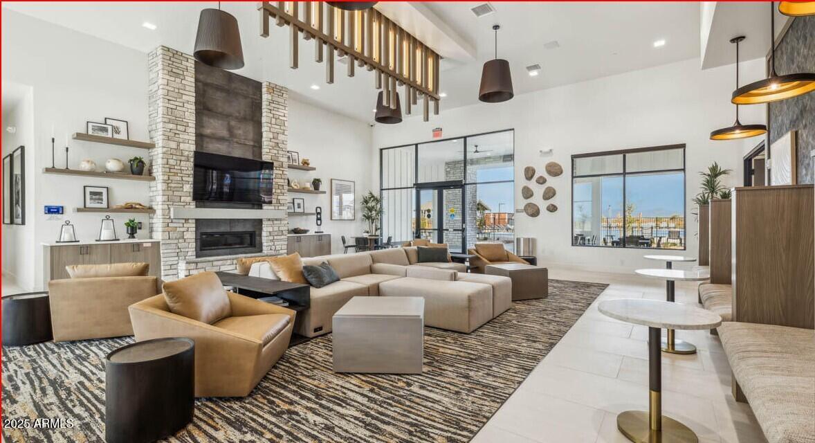 2108 West Sheridan Avenue Apache Junction, AZ 85120 - Photo 46 of 49 a living room with fireplace furniture and a rug