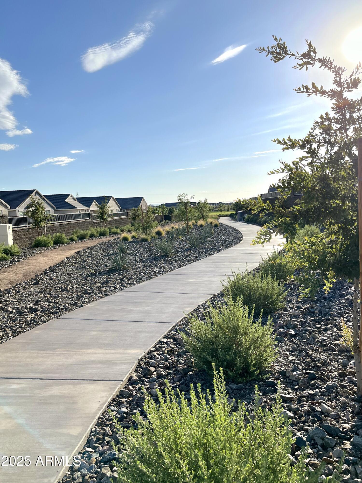 2108 West Sheridan Avenue Apache Junction, AZ 85120 - Photo 49 of 49 a view of a pathway both side of river and yard