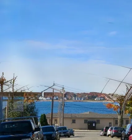 a view of a street with cars