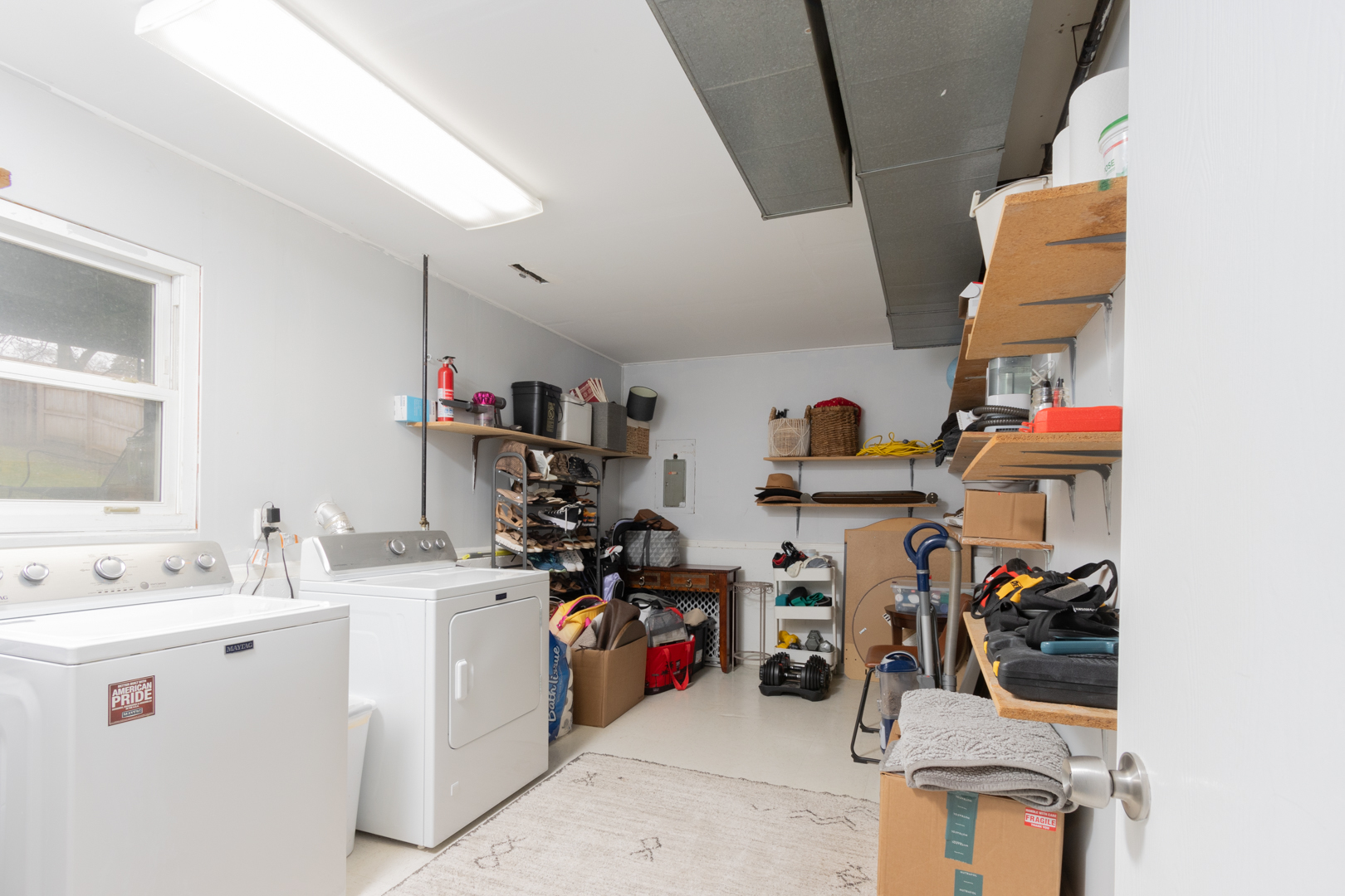 202 Augusta Drive McHenry, IL 60050 - Photo 14 of 18 a view of a kitchen with fridge and workspace