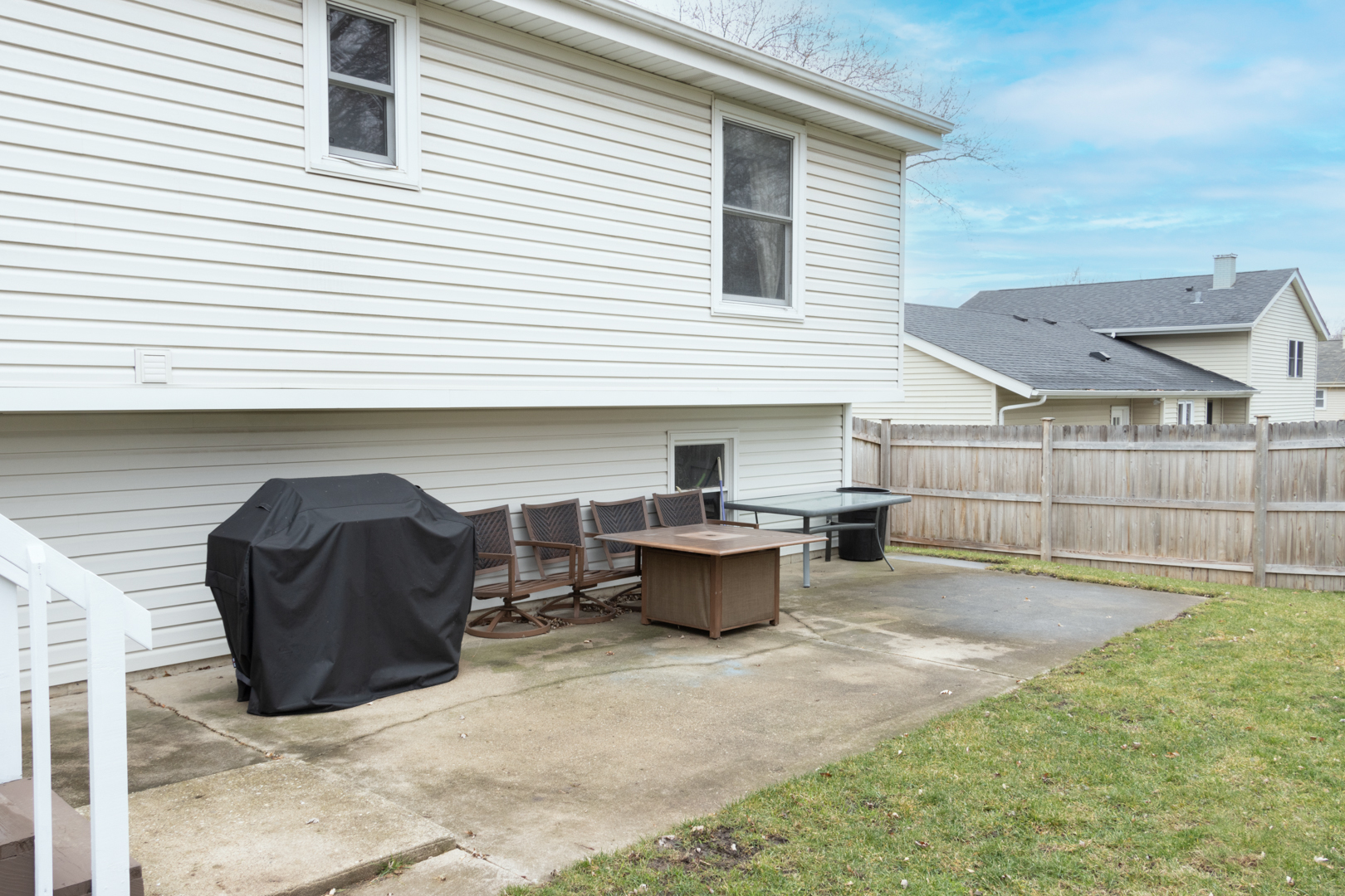 202 Augusta Drive McHenry, IL 60050 - Photo 17 of 18 a view of backyard with outdoor seating and barbeque oven