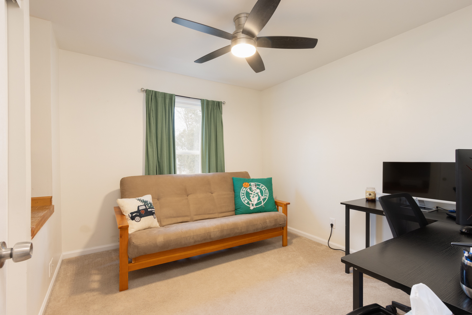 202 Augusta Drive McHenry, IL 60050 - Photo 10 of 18 a living room with furniture and a flat screen tv