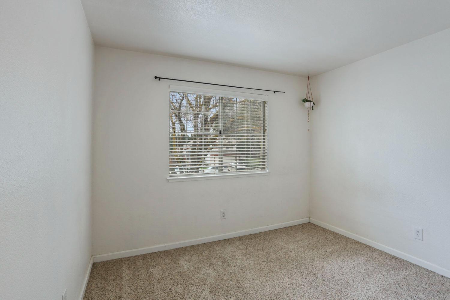 145 Machado Court Tracy, CA 95376 - Photo 15 of 28 an empty room with a window