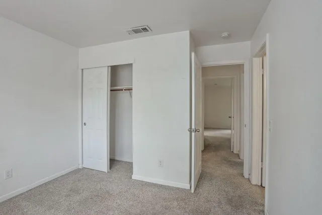 a view of a bathroom with a glass door