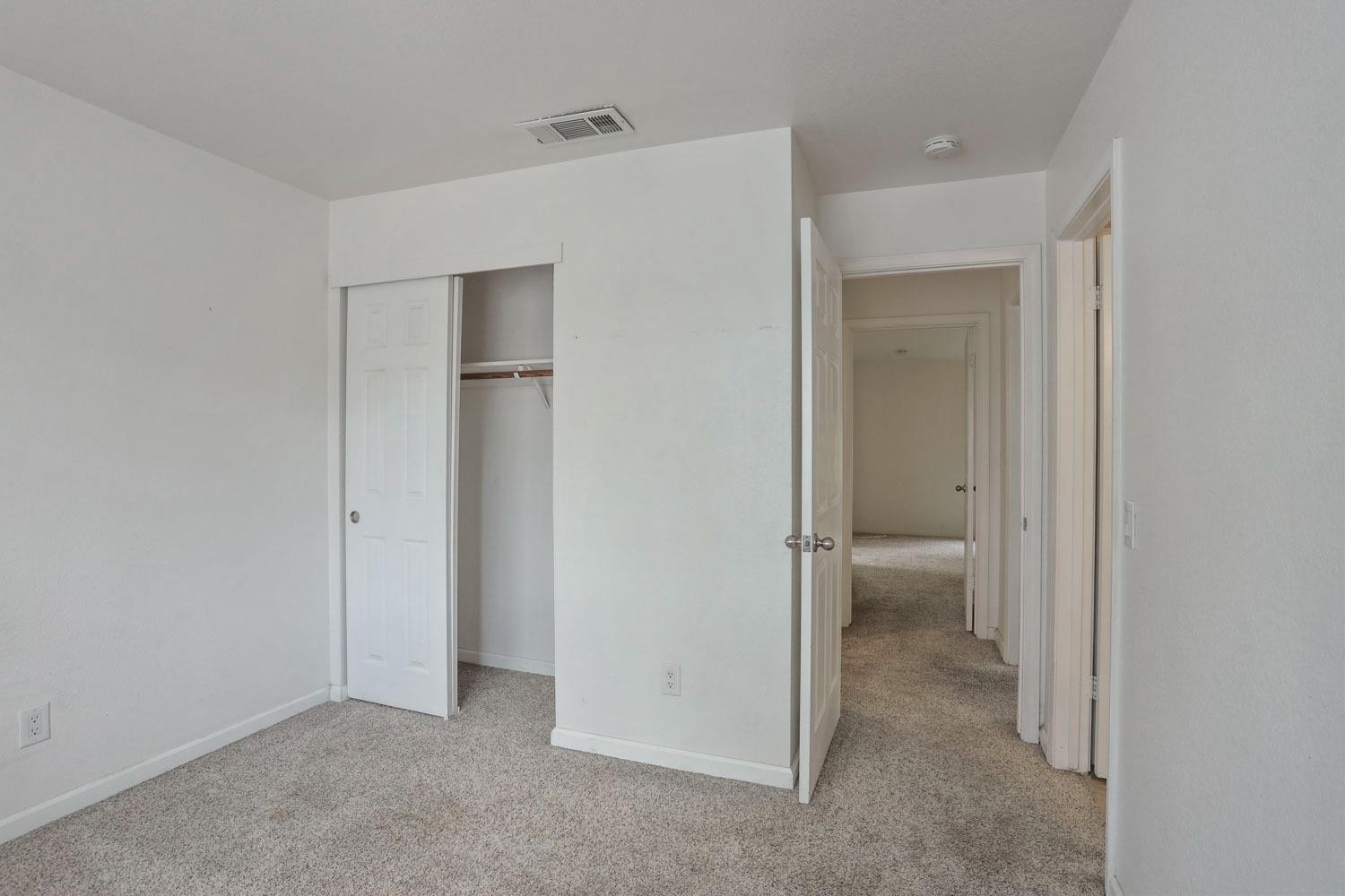 145 Machado Court Tracy, CA 95376 - Photo 16 of 28 a view of a bathroom with a glass door