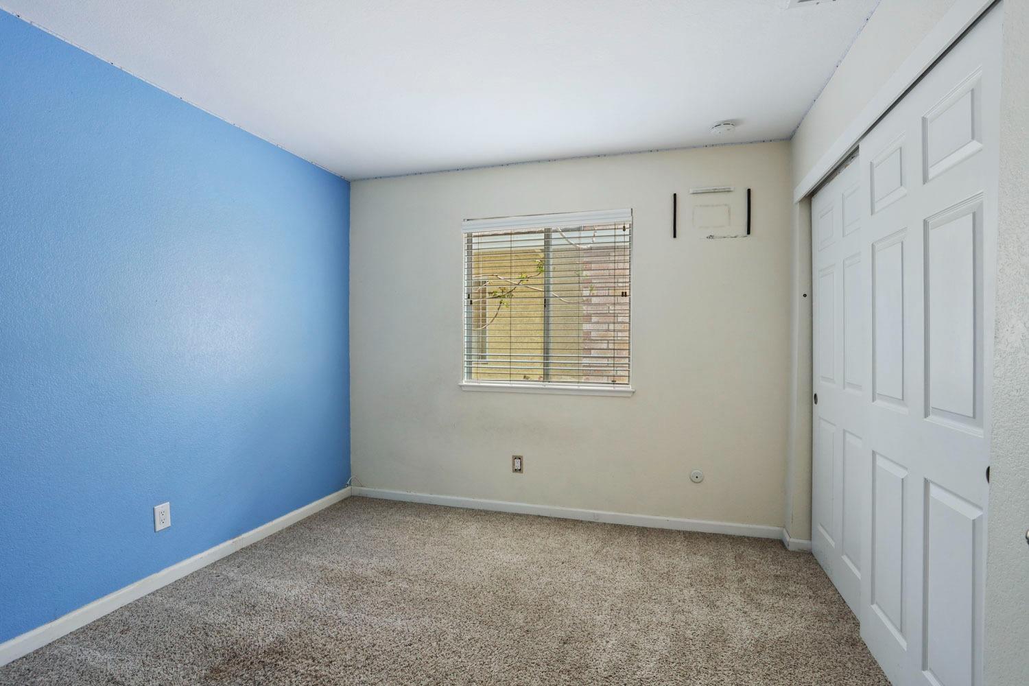 145 Machado Court Tracy, CA 95376 - Photo 18 of 28 an empty room with windows