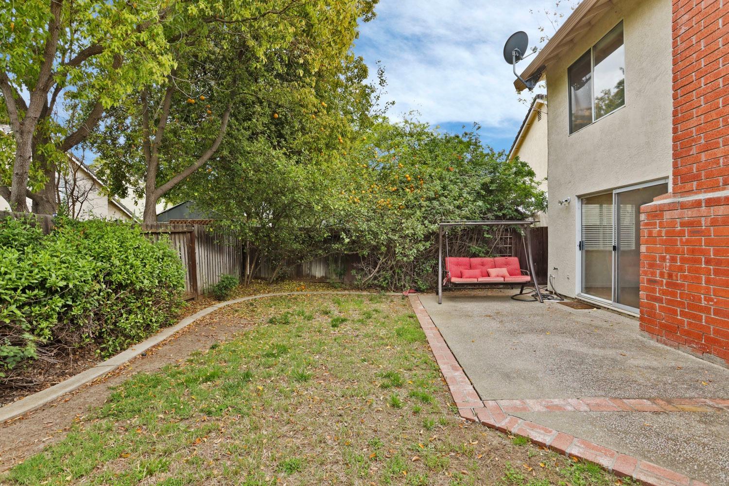 145 Machado Court Tracy, CA 95376 - Photo 25 of 28 a backyard of a house with lots of green space