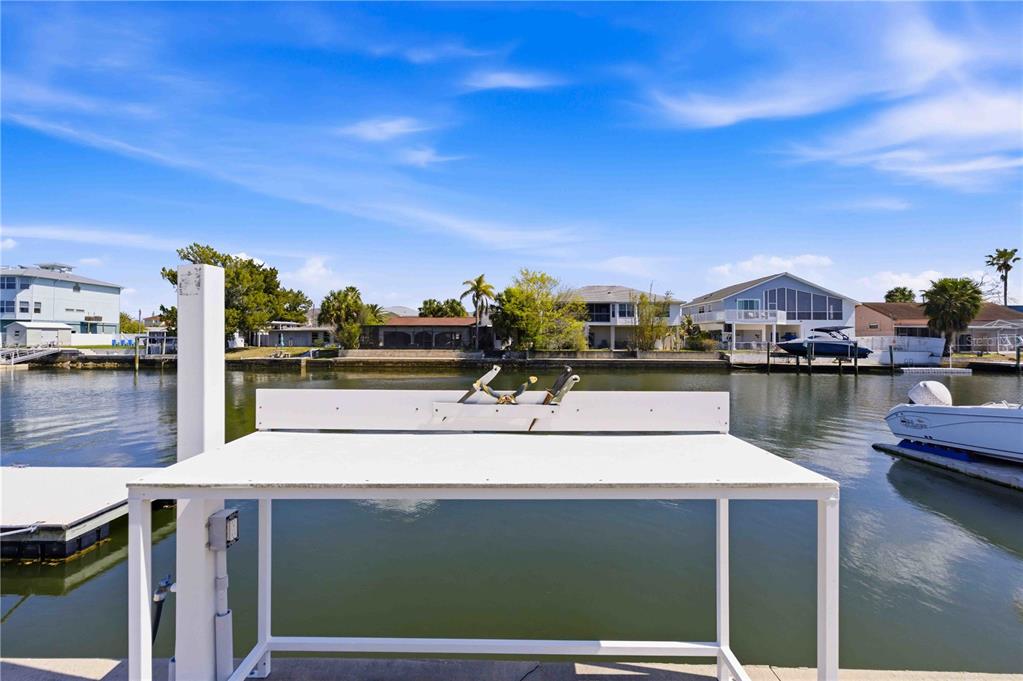 4530 Gulfstream Drive Hernando Beach, FL 34607 - Photo 11 of 16 a view of a lake with sitting area