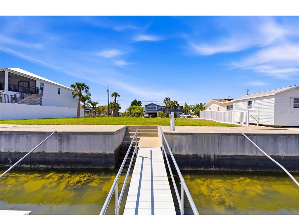 4530 Gulfstream Drive Hernando Beach, FL 34607 - Photo 13 of 16 a view of swimming pool with seating area and furniture