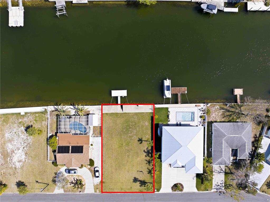 4530 Gulfstream Drive Hernando Beach, FL 34607 - Photo 3 of 16 an aerial view of a house with a swimming pool