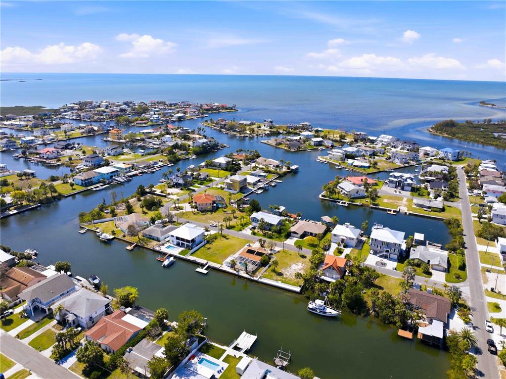 4530 Gulfstream Drive Hernando Beach, FL 34607 - Photo 7 of 16 an aerial view of a houses with ocean view