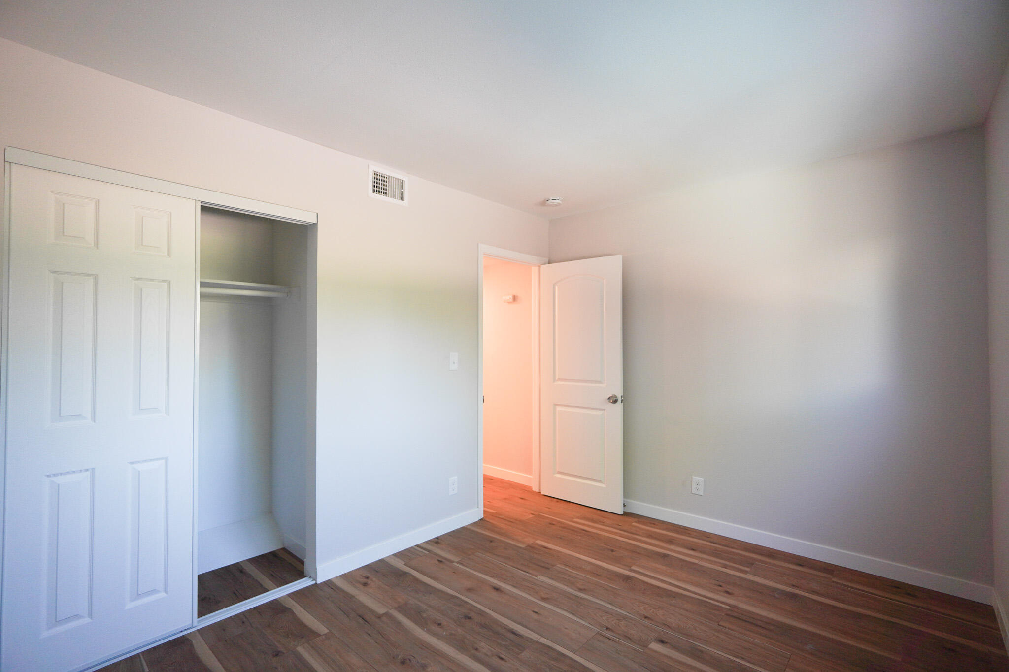 926 Talbert Avenue Simi Valley, CA 93065 - Photo 16 of 40 a view of an empty room with wooden floor