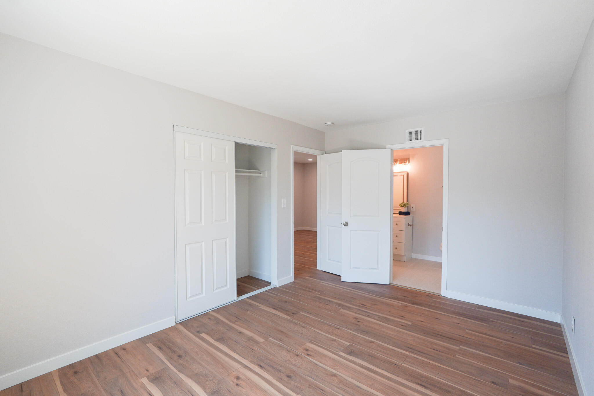 926 Talbert Avenue Simi Valley, CA 93065 - Photo 25 of 40 a view of a room with wooden floor and closet