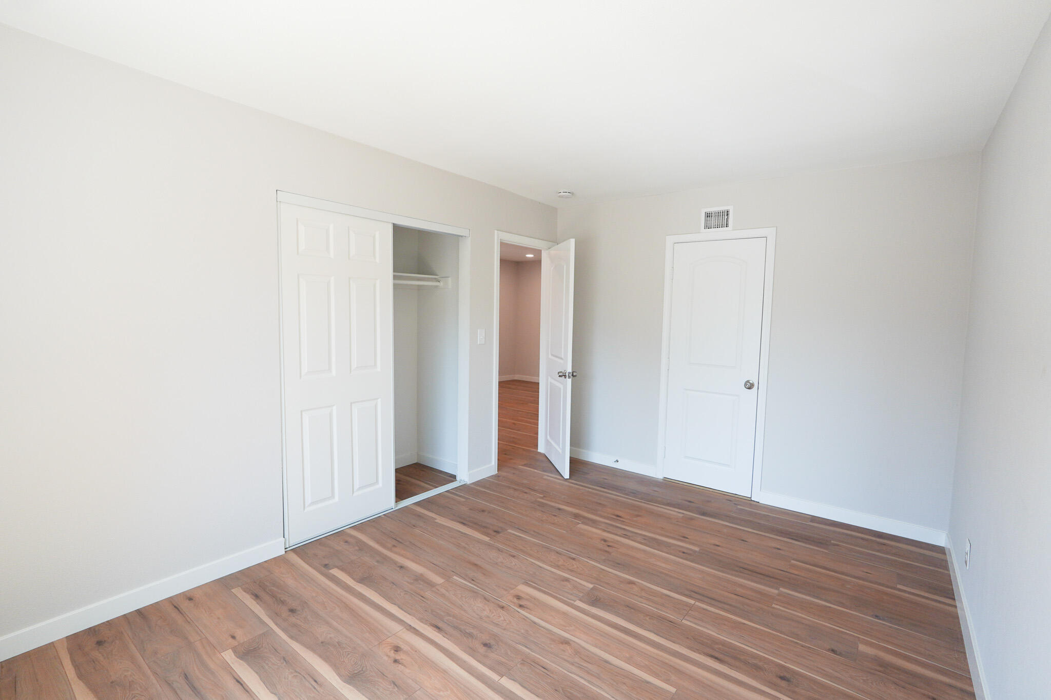 926 Talbert Avenue Simi Valley, CA 93065 - Photo 26 of 40 a view of a room with wooden floor and closet
