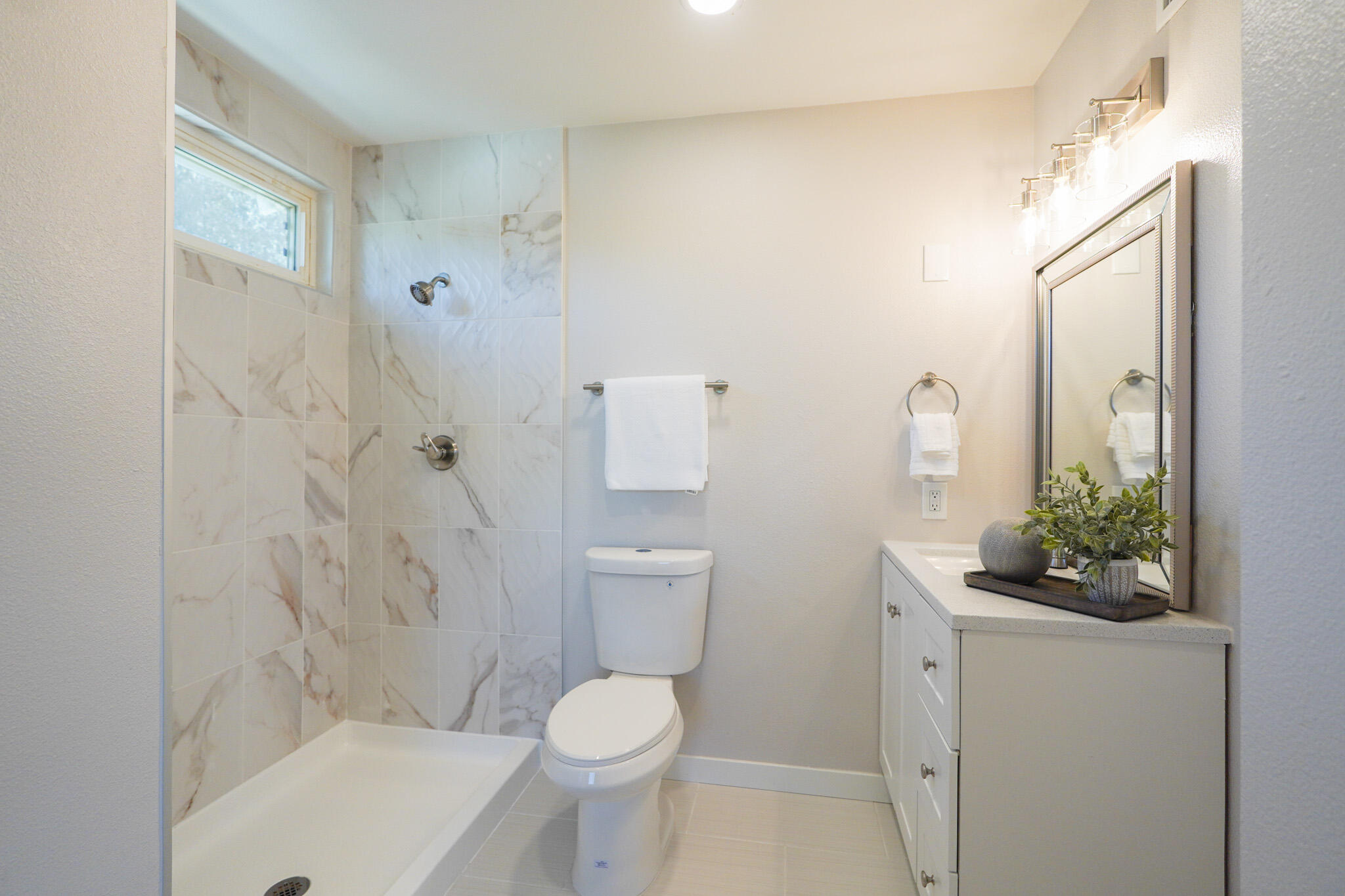 926 Talbert Avenue Simi Valley, CA 93065 - Photo 33 of 40 a bathroom with a sink a toilet and shower
