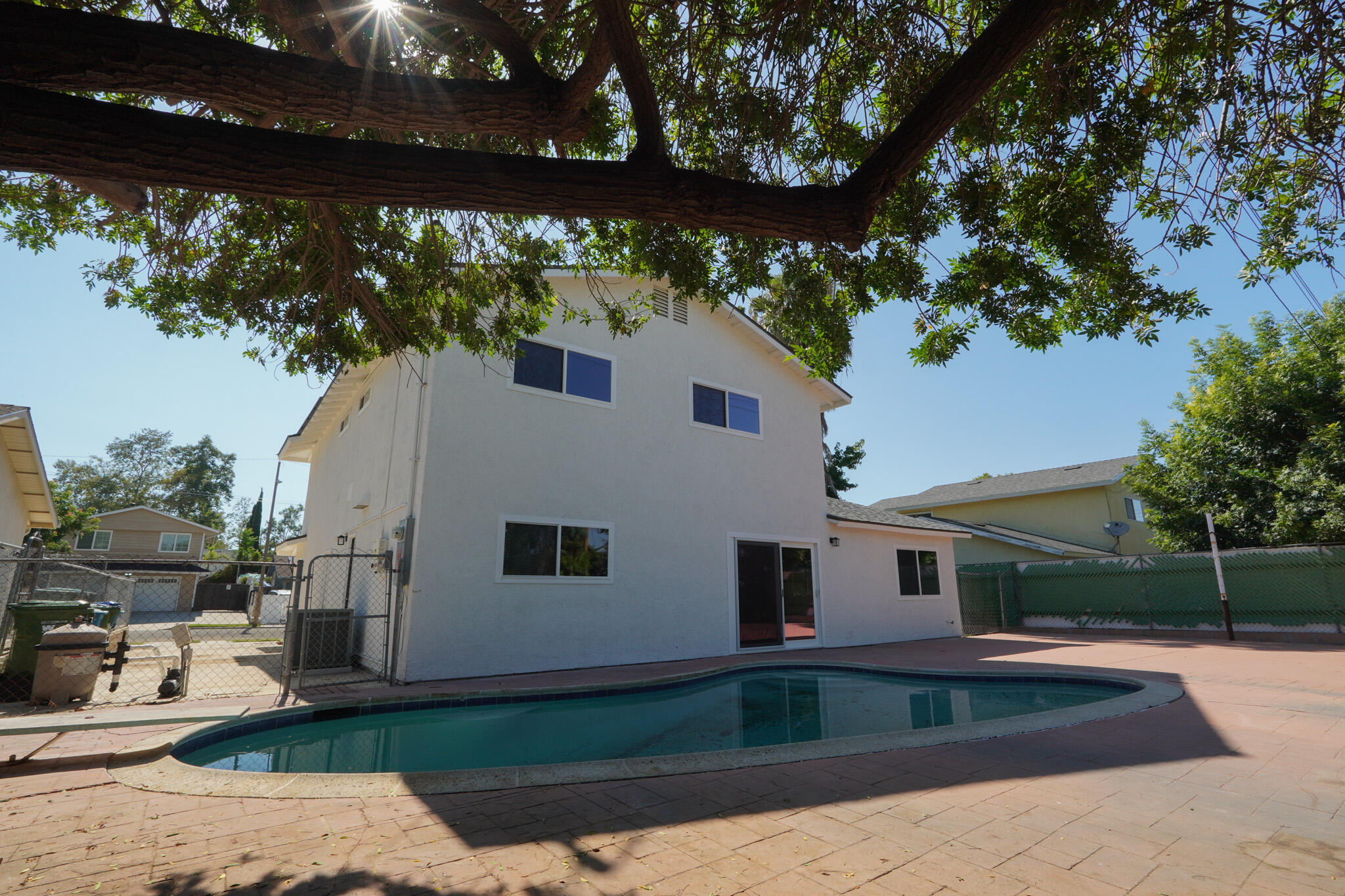 926 Talbert Avenue Simi Valley, CA 93065 - Photo 37 of 40 a view of a house with backyard sitting area and garden