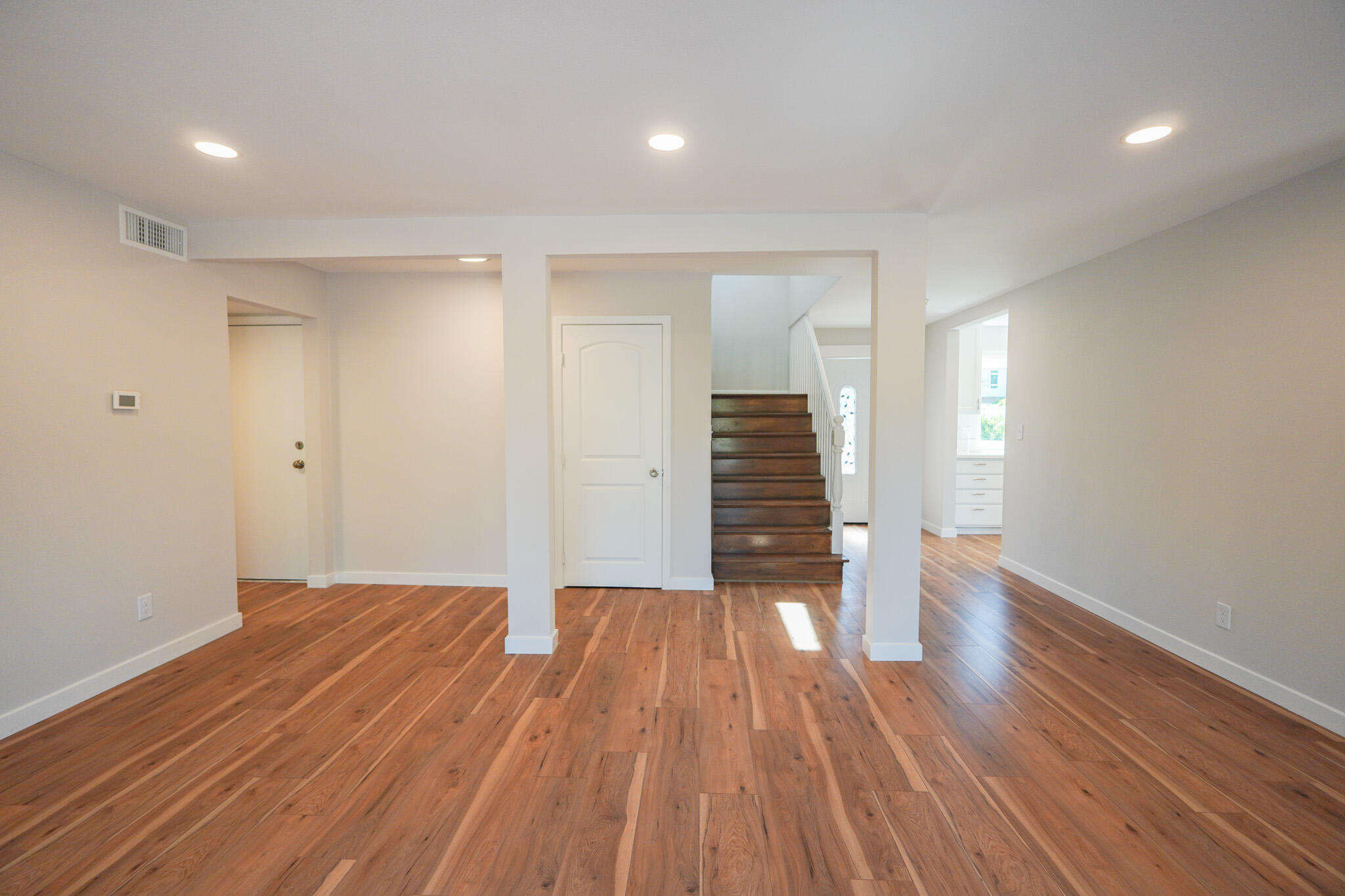 926 Talbert Avenue Simi Valley, CA 93065 - Photo 7 of 40 a view of an empty room with wooden floor