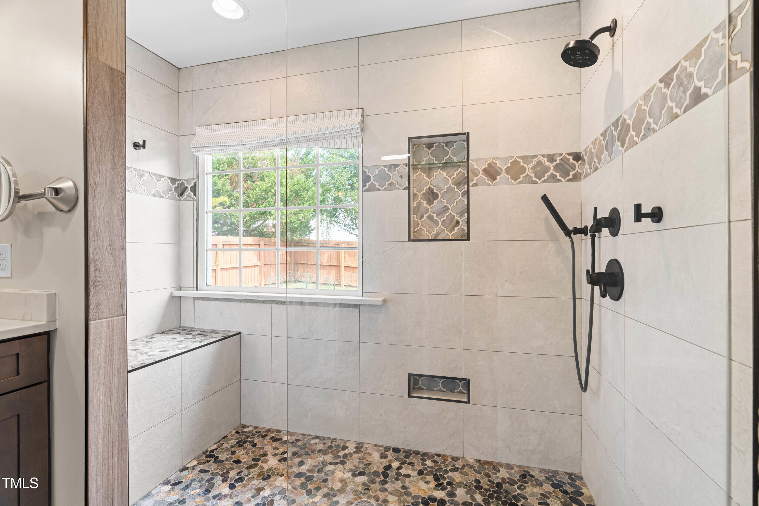 741 Rockville Road Wake Forest, NC 27587 - Photo 20 of 42 Walk in tiled shower with convenient seat
