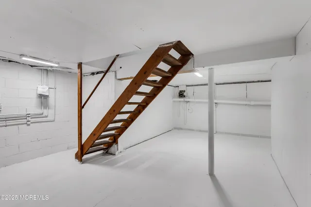 a view of a hallway with staircase