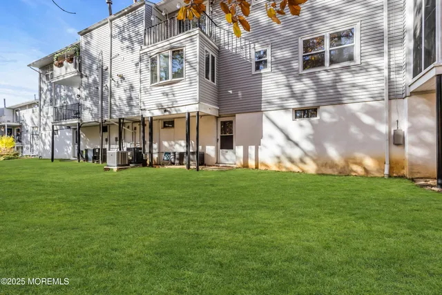 a view of a back yard of the house